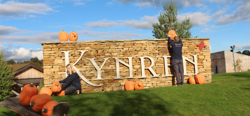 Kynren team members put out Halloween pumpkins in advance of Pyromusical.