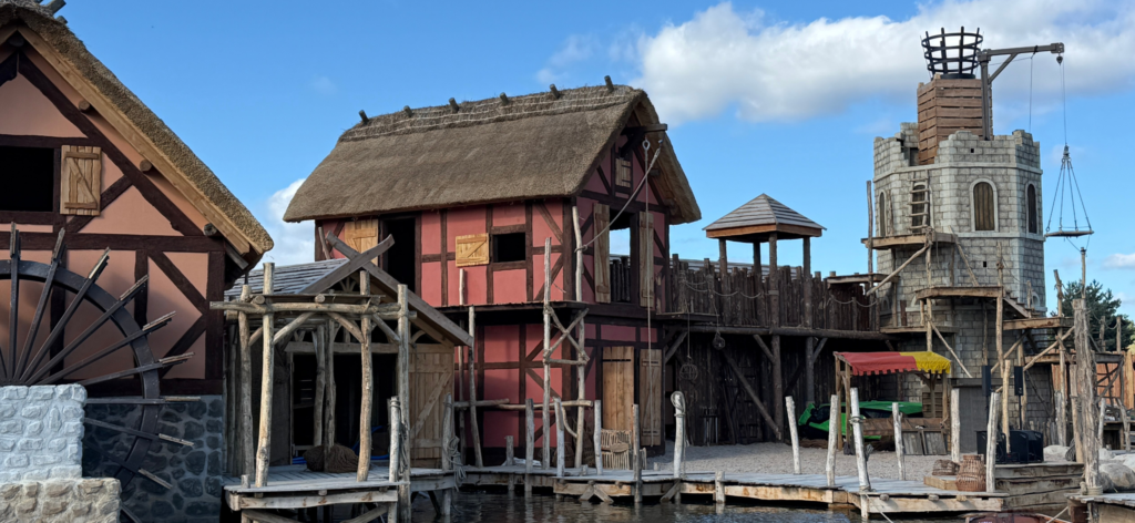 a medieval show set by a lake