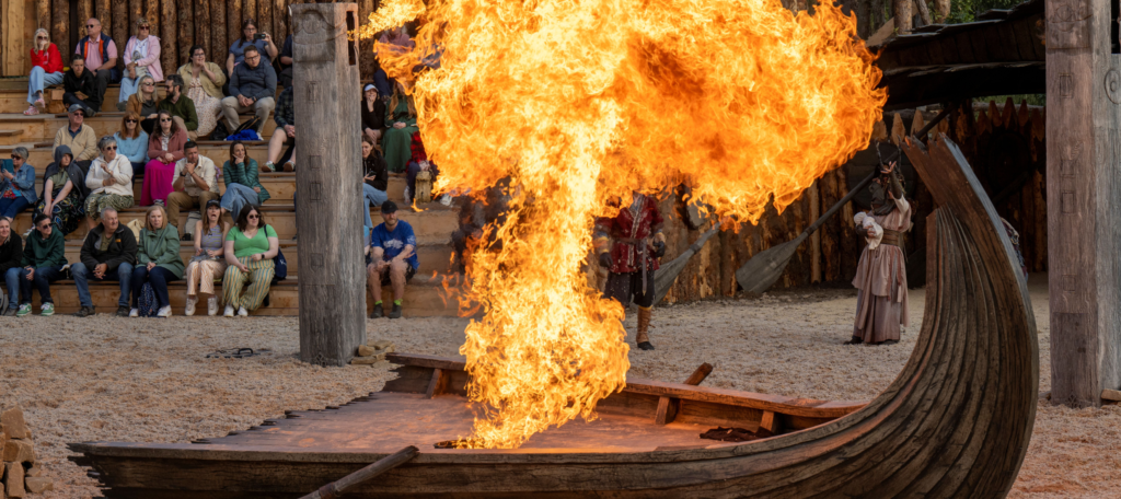 fire explodes from viking longboat